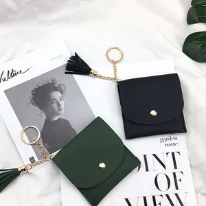 Mini soft leather coin purse with tassel keychain and litchi texture in black and green