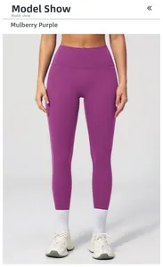 Close-up of mulberry purple high-waisted yoga pants with white side stripe detailing