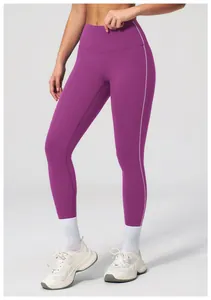 Detail showing high-waisted purple yoga pants with side white stripe and soft fabric