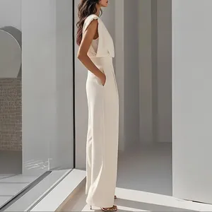 Side view of an elegant off-white sleeveless jumpsuit with wide-leg cut and smooth fabric