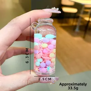 Close-up of a 6.3cm drift bottle keychain with colorful beads and 33.5g weight info