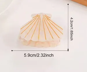 Detail view of shell-shaped acetate hair clip with dimensions 5.9cm by 4.2cm, set of 25