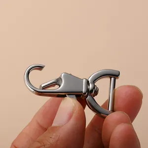 Close-up of 316 stainless steel swivel snap hook with spring gate for bags and keys