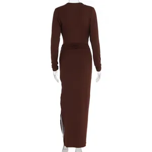 Detail view of dark brown slim fit long sleeve knit dress with back side slit
