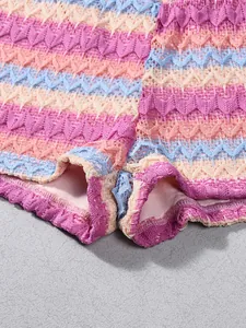 Macro view of wave-pattern crochet shorts with colorful stripes and soft inner lining