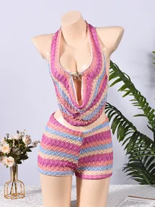 Detail of the crochet knit texture and starfish brooch on striped crop top set