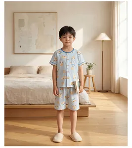 Close-up of baby short-sleeved cotton pajama set with light blue cartoon bear print
