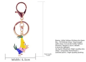 Detail view of rhinestone rooster keychain with dimensions 12.1cm and 22.5g weight