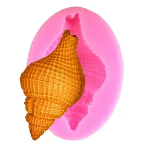 Pink silicone mold with conch shell pattern for DIY chocolate and ocean themed fondant