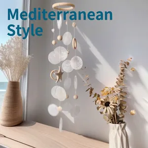 Starfish shell wind chime with translucent discs and wooden beads in coastal style