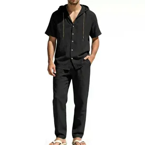 Detail view of black short sleeve hooded shirt and pants set in breathable cotton linen