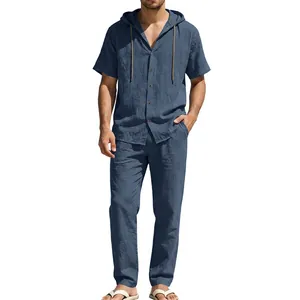 Close-up of men's blue cotton linen short sleeve hooded shirt and matching trousers set
