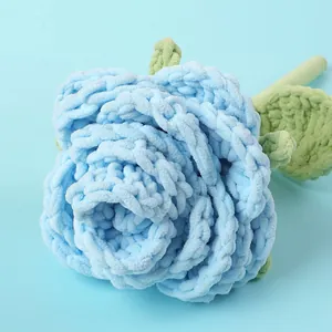 Handmade crochet rose flower in light blue yarn with green leaves for gift
