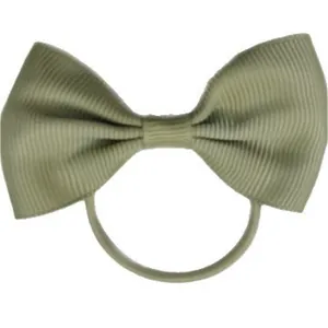 Sage green grosgrain ribbon bow hair tie for kids featuring a classic symmetrical design