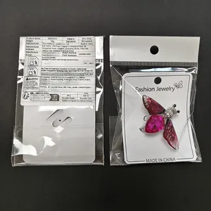 Detail shot of a cute crystal bee brooch with pink gemstone and rhinestone accents