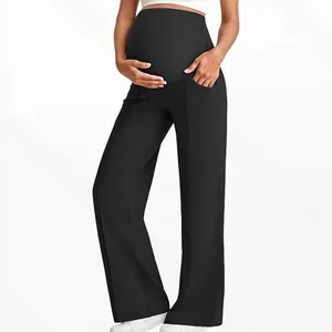 Close-up of high waist elastic maternity pants with belly support and side pockets