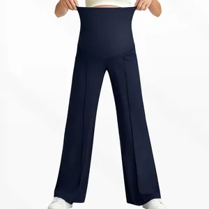 Macro detail of high waist stretchy maternity trousers with belly support band