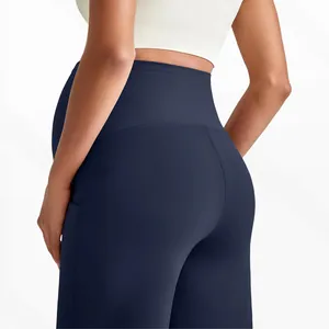 Detail of high-waist seamless pregnancy yoga pants with elastic belly support