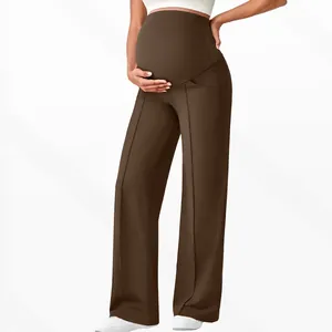 Detail view of maternity wide leg pants in chocolate brown with supportive high waistband