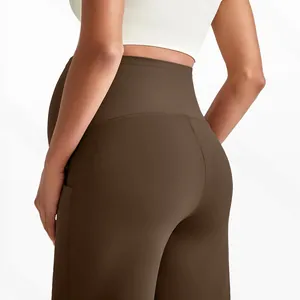 Detail view of high waist maternity yoga pants with side pockets and butt-lift design