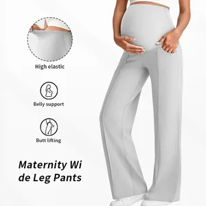 Close-up of light grey maternity wide leg pants with high waist belly support design