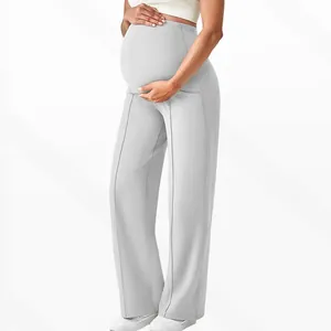Side view of light grey high-waist maternity trousers for belly support and comfort