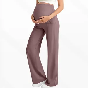 Detail view of high-waisted maternity wide leg pants showing tummy support design