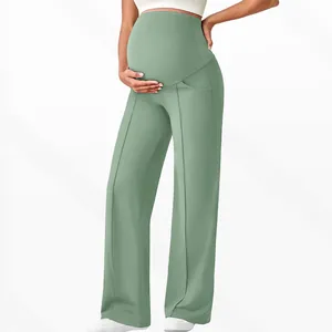 Close-up of high-waist maternity pants with supportive belly band and side pockets