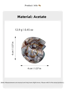 Detail view of shell-shaped acetate hair claw with size and weight specifications