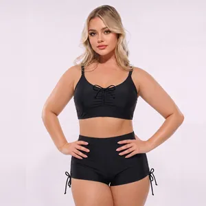 Close-up of black high-waisted bikini set with adjustable drawstring details
