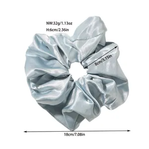 Detailed dimensions of the light blue oversized satin scrunchie showing 18cm diameter