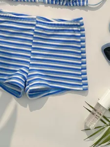 Detail of blue and white striped terry cloth bikini bottom with soft texture