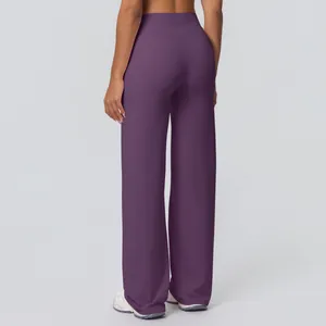 Rear view of high-waisted deep purple yoga flare pants with a smooth brushed texture