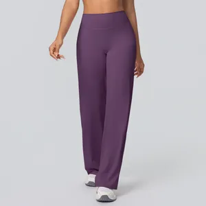 Detail of high waisted wide leg yoga pants in deep purple with soft brushed fabric
