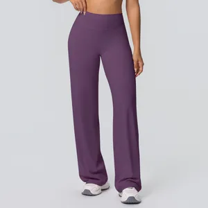 Front view of high waisted wide leg yoga pants in deep purple with brushed fabric detail