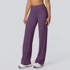 Detailed view of high waisted wide leg yoga pants in deep purple with elastic waistband