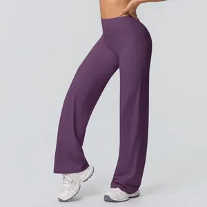 Detail of high waisted wide leg yoga pants in deep purple with wide tummy control waistband