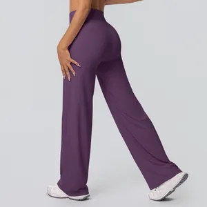 Detail view of high-waist dark purple wide-leg yoga pants with premium elastic fabric