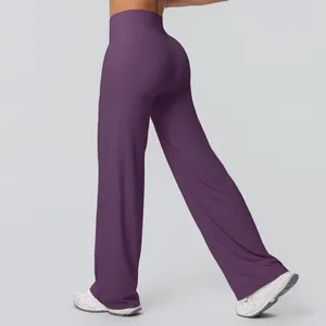 Deep purple high-waisted flared yoga pants with premium brushed texture and elastic fit