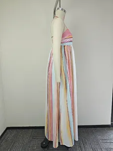 Side view of bohemian striped maxi dress with vibrant pastel vertical patterns