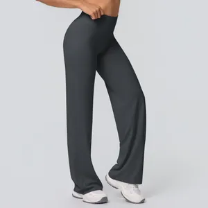 Detailed side view of high-waisted charcoal grey wide-leg yoga pants for women