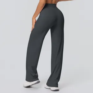 Detail view of the back showing high-waisted flared yoga pants with lift effect