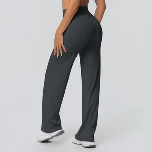 Close-up of high-waisted flared yoga pants in charcoal grey showing back side fit