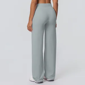 Detail of high waist light blue yoga pants with back V-seam for lifting effect