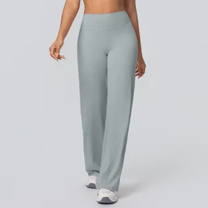 Close-up of high-waisted wide-leg yoga pants in soft blue-grey breathable fabric