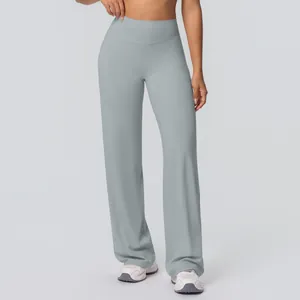Close-up of high-waist yoga flared pants in foggy blue brushed elastic fabric