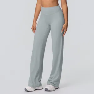 Detailed view of high waisted flared yoga pants in light grey blue with soft brushed fabric