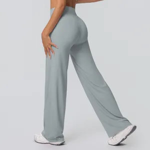 Close-up of high-waisted wide-leg yoga pants in dusty blue with sculpting effect