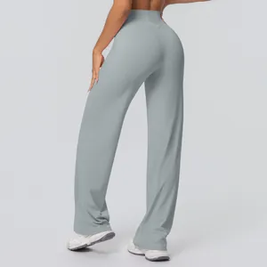 Detailed back view of high-waisted wide-leg yoga pants in soft grey-blue brushed fabric