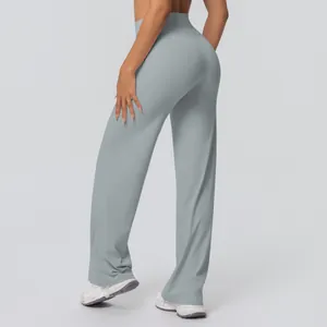 Detail shot of light blue-grey high waisted yoga flare pants with a smooth brushed finish
